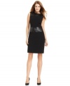 Bands of faux leather heighten the style quotient of this new sheath dress from Calvin Klein.