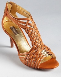 Metallic gold trim adds a little bit of luxe to Joan & David's Indee sandals. Metallic gold trim adds a little bit of luxe to Joan & David's Indee sandals.