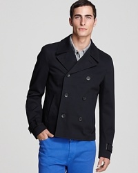 A handsome, trim jacket inspired by the peacoat offers a classic look with a modern silhouette for everyday appeal from Elie Tahari. A handsome, trim jacket inspired by the peacoat offers a classic look with a modern silhouette for everyday appeal from Elie Tahari.