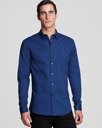 Solidify your wardrobe with a handsome button-down from Elie Tahari, a bold look in comfortable cotton with a bit of stretch to accommodate your full range of motion. Note the contrast button front, too, which subtly articulates your unique personality. Solidify your wardrobe with a handsome button-down from Elie Tahari, a bold look in comfortable cotton with a bit of stretch to accommodate your full range of motion. Note the contrast button front, too, which subtly articulates your unique personality.