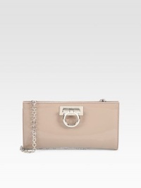 Glossy patent leather and elegant metal hardware details for a timeless look.Detachable shoulder strap, 9¿ dropMagnetic top closureLogo engraved metal detailOne inside open pocketsQuilted lining9W X 4.75H X 1.25DMade in Italy Glossy patent leather and elegant metal hardware details for a timeless look.Detachable shoulder strap, 9¿ dropMagnetic top closureLogo engraved metal detailOne inside open pocketsQuilted lining9W X 4.75H X 1.25DMade in Italy