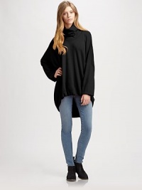 Dramatically oversized sweater of pure wool has a slouchy turtleneck, long dolman sleeves and a hi-lo hem. TurtleneckDropped shouldersLong dolman sleevesHi-lo hemBody: WoolDry cleanImportedModel shown is 5'10 (177cm) wearing US size Small. Dramatically oversized sweater of pure wool has a slouchy turtleneck, long dolman sleeves and a hi-lo hem. TurtleneckDropped shouldersLong dolman sleevesHi-lo hemBody: WoolDry cleanImportedModel shown is 5'10 (177cm) wearing US size Small.