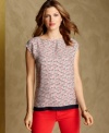 An allover horse print enlivens Tommy Hilfiger's breezy top. Pair it with colored jeans for a perfectly preppy ensemble.