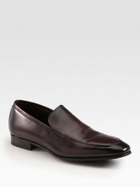 Timeless loafer crafted from soft Italian leather, finished with a finely stitched apron toe. Leather upperLeather and suede liningPadded insoleLeather and rubber soleMade in Italy Timeless loafer crafted from soft Italian leather, finished with a finely stitched apron toe. Leather upperLeather and suede liningPadded insoleLeather and rubber soleMade in Italy
