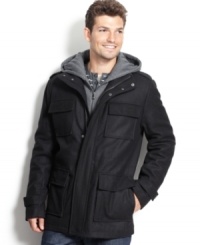 March to the beat of your own drum in this military-detailed hooded coat from Calvin Klein. March to the beat of your own drum in this military-detailed hooded coat from Calvin Klein.