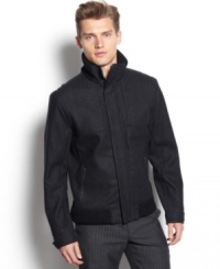 Keep warm in this fitted upgraded bomber style jacket by Calvin Klein. Keep warm in this fitted upgraded bomber style jacket by Calvin Klein.