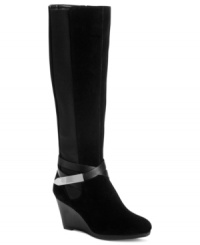 A sexy wedge takes the glam factor of Calvin Klein's Lucia tall boots up a notch--literally. A sexy wedge takes the glam factor of Calvin Klein's Lucia tall boots up a notch--literally.