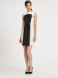 A sleek leather inset adds just the right contemporary edge to this contour-hugging crepe sheath.BoatneckSleevelessTop-fit bodiceSlash pocketsCenter back zipperAbout 20 from natural waist64% polyester/31% viscose/5% elastaneDry cleanMade in USA of imported fabricModel shown is 5'9½ (176cm) wearing US size 4. A sleek leather inset adds just the right contemporary edge to this contour-hugging crepe sheath.BoatneckSleevelessTop-fit bodiceSlash pocketsCenter back zipperAbout 20 from natural waist64% polyester/31% viscose/5% elastaneDry cleanMade in USA of imported fabricModel shown is 5'9½ (176cm) wearing US size 4.
