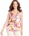 A lovely floral-print blooms onto Jones New York Collection's sleeveless plus size top, finished by a ruffled front.