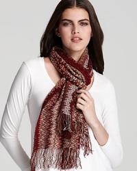 This oversized Missoni scarf is lightweight with pops of sparkle, thanks to metallic pink threads woven into the signature zig-zag print. This oversized Missoni scarf is lightweight with pops of sparkle, thanks to metallic pink threads woven into the signature zig-zag print.