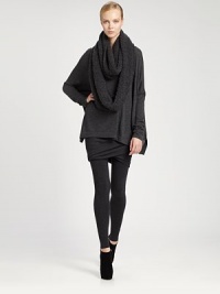 Luxurious cashmere blended with a touch of stretch in an easy-fit poncho style.Slightly oversizedRoundneckDropped shouldersLong sleevesAsymmetric hem78% cashmere/19% nylon/3% elastaneDry cleanImported of Italian fabricModel shown is 5'11 (180cm) wearing US size Small.