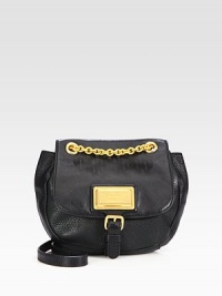 A subtle blend of luxurious pebbled leather and smooth leather with radiant hardware.Chain and leather shoulder strap, 18 dropMagnetic snap closure with flapOne inside zip pocketTwo inside open pocketsFully lined9½W X 7¾H X 2DImported A subtle blend of luxurious pebbled leather and smooth leather with radiant hardware.Chain and leather shoulder strap, 18 dropMagnetic snap closure with flapOne inside zip pocketTwo inside open pocketsFully lined9½W X 7¾H X 2DImported