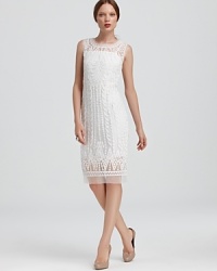 Exude ethereal style in this floating Catherine Malandrino dress, adorned with intricate embroidery. Blush heels are the perfect complement. Exude ethereal style in this floating Catherine Malandrino dress, adorned with intricate embroidery. Blush heels are the perfect complement.