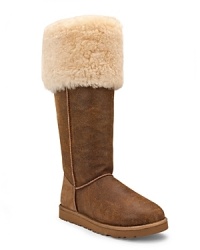 A wide shearling cuff adds cozy style to the classic suede Bailey boot from UGG® Australia. It's high style. A wide shearling cuff adds cozy style to the classic suede Bailey boot from UGG® Australia. It's high style.