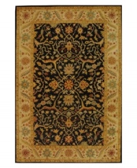 Enjoy a thousand years of rug-making tradition -- set against a bold black ground -- with this striking area rug from Safavieh. Tufted in India from pure wool, this rug emerges from the annals of antiquity to bring spectacular style and time-honored quality to your home. (Clearance) Enjoy a thousand years of rug-making tradition -- set against a bold black ground -- with this striking area rug from Safavieh. Tufted in India from pure wool, this rug emerges from the annals of antiquity to bring spectacular style and time-honored quality to your home. (Clearance)