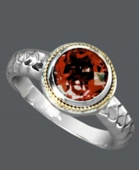 Make a bold statement with a vibrant cocktail ring. Balissima by Effy Collection's stunning style features a round-cut garnet (2-1/8 ct. t.w.) set in sterling silver with intricate rope edges crafted from 14k gold. Size 7. Make a bold statement with a vibrant cocktail ring. Balissima by Effy Collection's stunning style features a round-cut garnet (2-1/8 ct. t.w.) set in sterling silver with intricate rope edges crafted from 14k gold. Size 7.