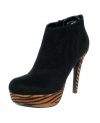 With its suede-like upper and covered platform, the Elira platform shooties by G by GUESS take sexy to brand new heights.