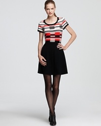 A geometric print feels ever-so-slightly 60's inspired on Shoshanna's knit sweater dress. A geometric print feels ever-so-slightly 60's inspired on Shoshanna's knit sweater dress.