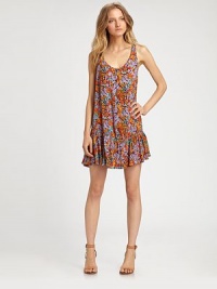 Floral-print favorite has a low scoopneck, hi-low ruffle hem and head-turning scoopback. ScoopneckSleevelessHi-low ruffle hemScoopbackAbout 18 from natural waist53% viscose/47% rayonDry cleanImportedModel shown is 5'10 (177cm) wearing US size Small. Floral-print favorite has a low scoopneck, hi-low ruffle hem and head-turning scoopback. ScoopneckSleevelessHi-low ruffle hemScoopbackAbout 18 from natural waist53% viscose/47% rayonDry cleanImportedModel shown is 5'10 (177cm) wearing US size Small.