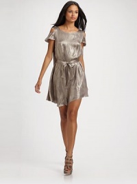 Shimmer print shift has an ingenious tunnel waist to sash front or back or wear loose and free.Bateau neck pullover Short sleeves with cutout shoulders Self sash Full silk lining About 32½, from shoulder to hem 74% silk/26% lurex Dry clean Imported Shimmer print shift has an ingenious tunnel waist to sash front or back or wear loose and free.Bateau neck pullover Short sleeves with cutout shoulders Self sash Full silk lining About 32½, from shoulder to hem 74% silk/26% lurex Dry clean Imported