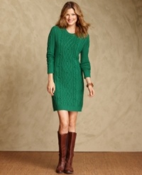 Create an on-trend textural look with Tommy Hilfiger's cable-knit sweater dress, complete with nubby bobbles. Create an on-trend textural look with Tommy Hilfiger's cable-knit sweater dress, complete with nubby bobbles.