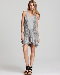 This bohemian-chic Sauce dress flaunts allover fringe for lively movement on the dance floor and beyond. This bohemian-chic Sauce dress flaunts allover fringe for lively movement on the dance floor and beyond.