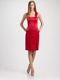 Lustrous stretch sateen style has double shoulder straps and unexpected cutout detail at the shoulders.Square neckline Topstitched shoulder straps Front vent Front and back seaming for fit Back shoulder cutout detail Concealed back zip Fully lined About 26 from natural waist 60% polyester/37% cotton/3% spandex Dry clean Made in USA of imported fabricOUR FIT MODEL RECOMMENDS ordering true size. Lustrous stretch sateen style has double shoulder straps and unexpected cutout detail at the shoulders.Square neckline Topstitched shoulder straps Front vent Front and back seaming for fit Back shoulder cutout detail Concealed back zip Fully lined About 26 from natural waist 60% polyester/37% cotton/3% spandex Dry clean Made in USA of imported fabricOUR FIT MODEL RECOMMENDS ordering true size.
