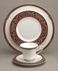 Impeccable design and superior craftsmanship have made Royal Doulton the world's leading fine china company. Its rich selection of heirloom-quality china, everyday tableware, crystal and accessories will grace your home for generations to come. Handsome and majestic, the Tennyson dinnerware pattern presents translucent white china banded in a rich neoclassical pattern of golden and deep red leaves, and finished with polished gold rims. Impeccable design and superior craftsmanship have made Royal Doulton the world's leading fine china company. Its rich selection of heirloom-quality china, everyday tableware, crystal and accessories will grace your home for generations to come. Handsome and majestic, the Tennyson dinnerware pattern presents translucent white china banded in a rich neoclassical pattern of golden and deep red leaves, and finished with polished gold rims.