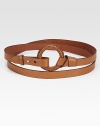 Two butter-soft leather straps complemented by a signature O-ring. This classic belt wraps around the waist twice for an undeniably chic look.About 1 wideLeatherImported