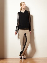 Classic, wool-rich sweater restored by semi-sheer chiffon sleeves. V-neckLong semi-sheer sleevesRibbed cuffs and hemBody: 88% merino wool/12% camel hairTrim: PolyesterDry cleanImportedModel shown is 5'10 (177cm) wearing US size Small. Classic, wool-rich sweater restored by semi-sheer chiffon sleeves. V-neckLong semi-sheer sleevesRibbed cuffs and hemBody: 88% merino wool/12% camel hairTrim: PolyesterDry cleanImportedModel shown is 5'10 (177cm) wearing US size Small.