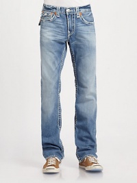 A classic straight-leg fit with traditional natural stitching in an aged wash for a worn-in look. Five-pocket styleZip flyStitched back flap pocketsInseam, about 34CottonMachine washMade in USA A classic straight-leg fit with traditional natural stitching in an aged wash for a worn-in look. Five-pocket styleZip flyStitched back flap pocketsInseam, about 34CottonMachine washMade in USA