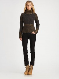 A chunky pullover in a variety of rich melange yarns has an intriguing tweedy effect.Ribbed turtleneck collarContrast shouldersSlightly tapered at the waist with logo tagLong sleeves with wide ribbed contrast cuffsWide ribbed subtly flared hemAbout 22 from shoulder to hemWool/nylon/silkDry cleanImportedSIZE & FITModel shown is 5'10½ (179cm) wearing US size Small. A chunky pullover in a variety of rich melange yarns has an intriguing tweedy effect.Ribbed turtleneck collarContrast shouldersSlightly tapered at the waist with logo tagLong sleeves with wide ribbed contrast cuffsWide ribbed subtly flared hemAbout 22 from shoulder to hemWool/nylon/silkDry cleanImportedSIZE & FITModel shown is 5'10½ (179cm) wearing US size Small.