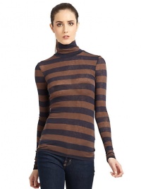 THE LOOKAllover stripesTurtleneckPullover styleTHE FITAbout 25 from shoulder to hemTHE MATERIALLyocell/wool/spandexCARE & ORIGINHand washImportedModel shown is 5'10 (177cm) wearing US size Small. THE LOOKAllover stripesTurtleneckPullover styleTHE FITAbout 25 from shoulder to hemTHE MATERIALLyocell/wool/spandexCARE & ORIGINHand washImportedModel shown is 5'10 (177cm) wearing US size Small.