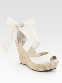 Soft suede straps top an espadrille wedge and platform, finishing with silk ties that form a bow at the ankle. Braided hemp wedge, 5 (125mm)Braided hemp platform, 1½ (40mm)Compares to a 3½ heel (90mm)Silk and suede upperLeather liningRubber solePadded insoleImported Soft suede straps top an espadrille wedge and platform, finishing with silk ties that form a bow at the ankle. Braided hemp wedge, 5 (125mm)Braided hemp platform, 1½ (40mm)Compares to a 3½ heel (90mm)Silk and suede upperLeather liningRubber solePadded insoleImported