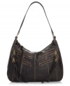 Laid-back with urban appeal, this slouchy-chic hobo from Marc New York ups the ante on everyday accessorizing. Distressed leather is paired with zip pockets and tassel pulls, while the spacious interior stows all your it-girl essentials.