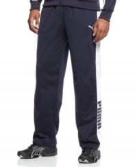 Stay in tune with active comfort and style in these tricot track pants from Puma. Stay in tune with active comfort and style in these tricot track pants from Puma.