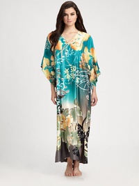 Vivid florals transform this comfortable design in smooth, easy-to-wear fabric. V-neckThree-quarter kimono sleevesAbout 52 from shoulder to hemPolyesterMachine washImported Vivid florals transform this comfortable design in smooth, easy-to-wear fabric. V-neckThree-quarter kimono sleevesAbout 52 from shoulder to hemPolyesterMachine washImported