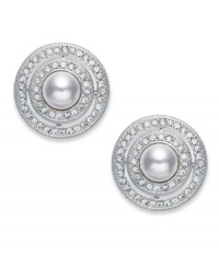 Frame your look with Eliot Danori's elegant button earrings. Featuring framed simulated pearls (6 mm) with genuine mother-of-pearl coating. Embellished with crystal accents. Set in rhodium-plated mixed metal. Approximate diameter: 5/8 inch. Frame your look with Eliot Danori's elegant button earrings. Featuring framed simulated pearls (6 mm) with genuine mother-of-pearl coating. Embellished with crystal accents. Set in rhodium-plated mixed metal. Approximate diameter: 5/8 inch.
