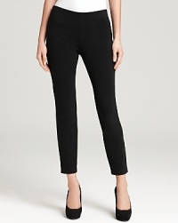 A hassle-free approach to everyday dressing, these Eileen Fisher pants flaunt a slim cut and a clean silhouette for a sleek, flattering fit. A hassle-free approach to everyday dressing, these Eileen Fisher pants flaunt a slim cut and a clean silhouette for a sleek, flattering fit.