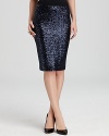 Sequins go ultra-chic on this classic Catherine Malandrino pencil skirt with solid contrasts.