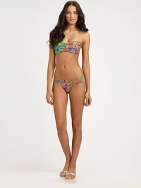 Vibrantly designed and featuring a feminine, twist front for a gorgeous effect. Twist-front bandeau topBack clasp closureFully lined80% nylon/20% Lycra®Hand washMade in USA of Italian fabric Please note: Bikini bottom sold separately. Vibrantly designed and featuring a feminine, twist front for a gorgeous effect. Twist-front bandeau topBack clasp closureFully lined80% nylon/20% Lycra®Hand washMade in USA of Italian fabric Please note: Bikini bottom sold separately.