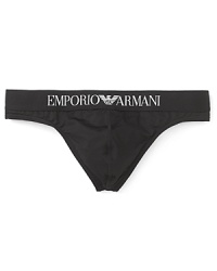 With its sleek cut and smooth fabrication, Armani's thong is an essential foundation for slim-fitting styles. With its sleek cut and smooth fabrication, Armani's thong is an essential foundation for slim-fitting styles.