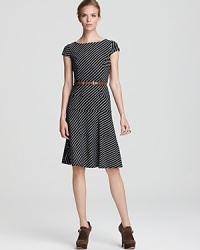 A swing skirt lends a ladylike look to this belted Anne Klein dress, printed in diagonal stripes. A swing skirt lends a ladylike look to this belted Anne Klein dress, printed in diagonal stripes.