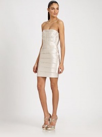 Bands of satiny piping and sequined details dress up this sexy, form-fitting style.StraplessAllover pipingSequined embroideryConcealed back zipAbout 19 from natural waistPolyesterDry cleanImportedModel shown is 5'10½ (179cm) wearing US size 4. Bands of satiny piping and sequined details dress up this sexy, form-fitting style.StraplessAllover pipingSequined embroideryConcealed back zipAbout 19 from natural waistPolyesterDry cleanImportedModel shown is 5'10½ (179cm) wearing US size 4.