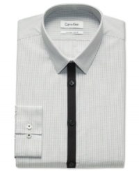 A contrast color placket gives this Calvin Klein shirt a unique and sleek style. A contrast color placket gives this Calvin Klein shirt a unique and sleek style.