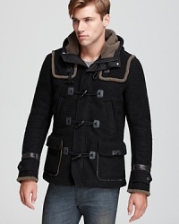 Stay cool in the cold with this spot-on warm duffel jacket featuring fleece lining and detailing, leather trim and a plush hood. Stay cool in the cold with this spot-on warm duffel jacket featuring fleece lining and detailing, leather trim and a plush hood.