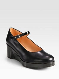 A patent leather wedge and adjustable ankle strap add a touch of sheen to this leather Mary Jane silhouette. Patent leather wedge, 2¼ (60mm)Patent leather platform, ¾ (20mm)Compares to a 1½ heel (40mm)Leather upperAdjustable patent leather strapLeather lining and solePadded insoleImported A patent leather wedge and adjustable ankle strap add a touch of sheen to this leather Mary Jane silhouette. Patent leather wedge, 2¼ (60mm)Patent leather platform, ¾ (20mm)Compares to a 1½ heel (40mm)Leather upperAdjustable patent leather strapLeather lining and solePadded insoleImported
