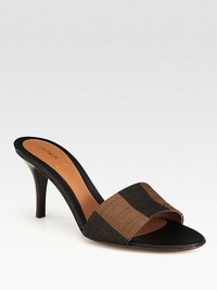Logo-printed canvas jacquard covers this elegant silhouette with a stacked heel. Stacked heel, 3 (75mm)Canvas jacquard upperLeather lining and solePadded insoleMade in ItalyOUR FIT MODEL RECOMMENDS ordering true size. Logo-printed canvas jacquard covers this elegant silhouette with a stacked heel. Stacked heel, 3 (75mm)Canvas jacquard upperLeather lining and solePadded insoleMade in ItalyOUR FIT MODEL RECOMMENDS ordering true size.