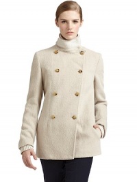 THE LOOKDouble stand collar with knit layerDouble-breasted button frontLong sleeves with rib-knit cuffsBack storm shieldTHE FITAbout 28 from shoulder to hemTHE MATERIAL65% alpaca/35% woolSecond fabric: 63% wool/25% nylon/10% cashmere/2% elastaneFully linedCARE & ORIGINDry cleanMade in ItalyModel shown is 5'10 (177cm) wearing US size 4. 