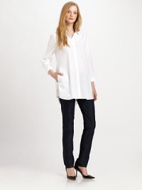An elongated design featuring a modern hi-low hem, this stretch-cotton blouse has everything needed to create a flawless fit.Collar neckLong sleevesButton-front styleSlash pocketsHi-lo hemAbout 29 from shoulder to hem72% cotton/23% polyamide/5% Lycra®Dry cleanImported Model shown is 5'9½ (176cm) wearing US size Small. An elongated design featuring a modern hi-low hem, this stretch-cotton blouse has everything needed to create a flawless fit.Collar neckLong sleevesButton-front styleSlash pocketsHi-lo hemAbout 29 from shoulder to hem72% cotton/23% polyamide/5% Lycra®Dry cleanImported Model shown is 5'9½ (176cm) wearing US size Small.